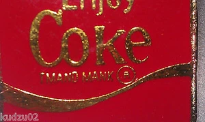 Vintage Coca-Cola Enjoy Coke Tmano Mank Pin Button Lapel - Picture 1 of 5