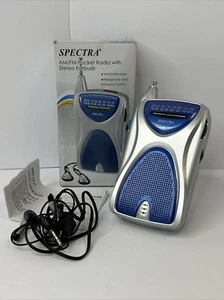 Spectra Pocket Radio AM/FM con auricolari scatola aperta ZZ1 - Foto 1 di 7