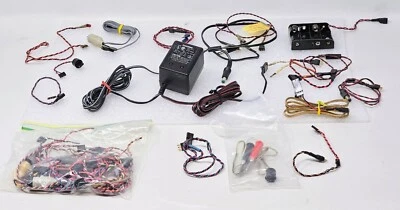 Cargador de pared Futaba FBC-19B (4) con cables varios Foto 1 de 4