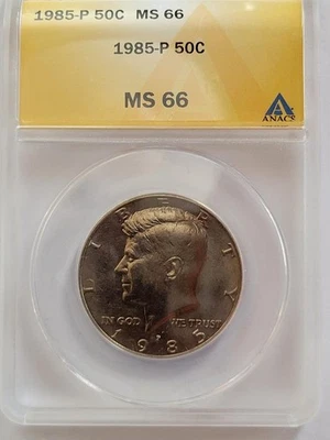 1985 P JOHN F. KENNEDY 1/2 DOLLAR 50C  ANACS MS 66    - Image 1 of 4