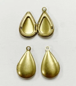 6 PIECES VINTAGE BRASS 15x10mm. TEAR DROP SMOOTH PENDANT LOCKETS 5111 - Picture 1 of 3