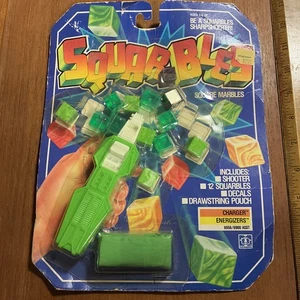 VINTAGE 1987 HASBRO SQUARBLES SQUARE MARBLE SHOOTER SPIELZEUG - FABRIKVERSIEGELT - Bild 1 von 4