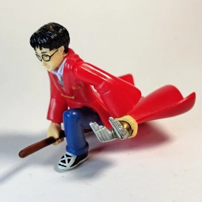2001 Harry Potter on broomstick w/ Golden Snitch Quidditch Vinyl Figure 2 1/4" - Image 1 of 4
