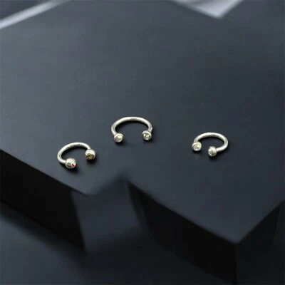 Set da 3 Piercing Bilanciere Circolare in Acciaio Chirurgico mm. 1,2 e Zirconi - Immagine 1 di 4