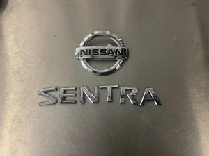 Nissan Sentra emblem badge letters trunk lid logo rear OEM Factory Genuine Stock - Picture 1 of 2
