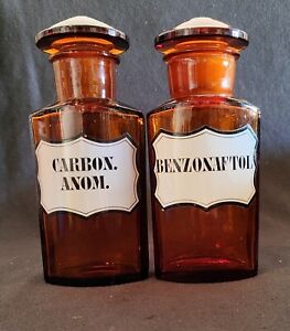 Nice old pair of pharmacy bottles in amber color!! 8"