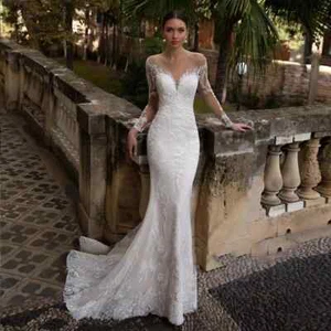 Squisiti abiti da sposa a sirena scollo a V maniche lunghe pizzo applique abiti da sposa - Foto 1 di 9