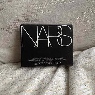 Nars Light Reflecting Setting Pressed Powder SUNSTONE 5896 - Size 0.35 Oz / 10 g - Image 1 of 4