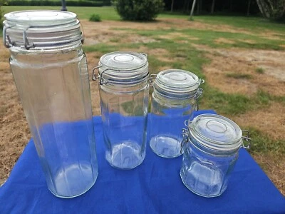  Glass Canister Set Of 4 Kitchen Jars, Wire Closure With Seal. - Image 1 of 4