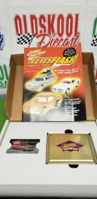 Johnny Lightning Collector Club Membership Kit w/ Gold Tin 1:64 scale & Keychain - Image 1 of 4