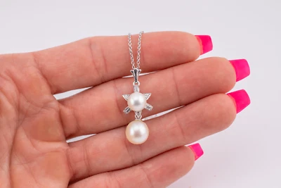 Elegant 14 Karat White Gold Estate Pearl and Diamond Choker Style Necklace - Image 1 of 4