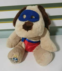 JUGUETE PERRO MATER MIRACLE MAX CON CAPA Y GAFAS AZULES SUPERHÉROE 25 CM DE ALTO - Imagen 1 de 2
