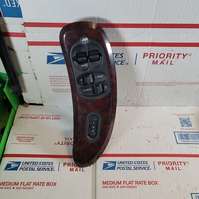 01-03 Interruptor de ventana de puerta delantera para conductor CARAVAN TOWN AND COUNTRY lado del conductor OEM Foto 1 de 4