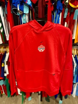 NUEVO CON ETIQUETAS AUTÉNTICO Suéter con Capucha Nike Canadá 2022 - Mujer (L) Foto 1 de 4