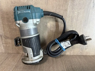 Makita RT0700C 1/4” 710W Trimmer Router - image 1 of 4