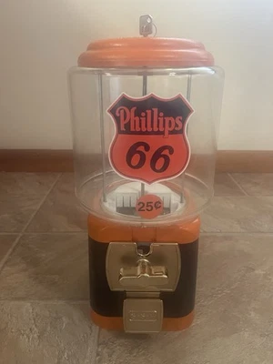 Máquina de chicle de gas y petróleo PHILLIPS 66--25 centavos--marca SSF--funciona y tiene llave Foto 1 de 4