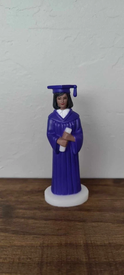 Estatuilla de graduado vintage marrón niña/tapa de pastel/bata azul púrpura Foto 1 de 1