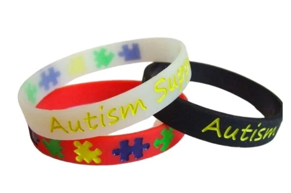 Support Autism Awareness Wristband RED BLACK GLOW in the DARK Silicone Bracelet - Image 1 of 1