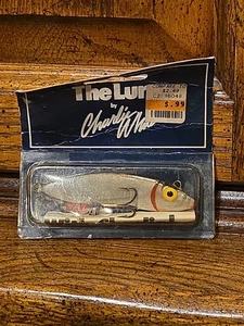 De colección — The Lure TM de Charlie White. Sin abrir y sin pescar. Embalaje envejecido - Imagen 1 de 2