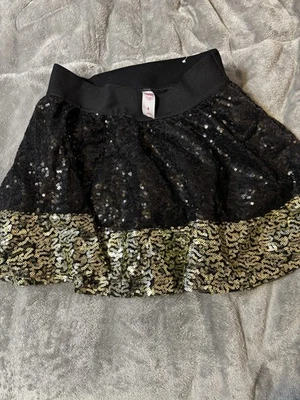 ¡Falda de vacaciones brillante Justice Girl! Lentejuelas negras/doradas talla 8 nuevas sin etiquetas Foto 1 de 3