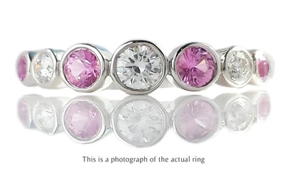 Anillo de jazz de diamantes y zafiros rosas de Tiffany & Co Foto 1 de 4