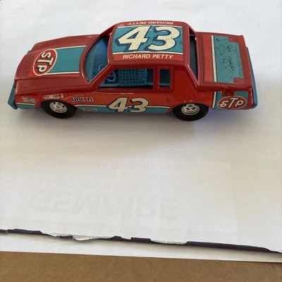 Richard Petty Signed 1980's NASCAR #43 ERTL 12"  GRAND NATIONAL STP Toy Car - Image 1 of 4