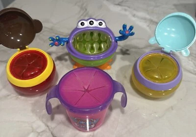 Lote de 4 tazas porta aperitivos Nuby Monster Keeper entrenamiento para niños pequeños Foto 1 de 4