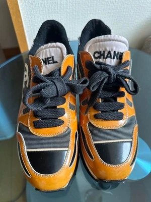 CHANEL Women’s Sneakers Orange Black Lace Up Shoes - Image 1 of 4