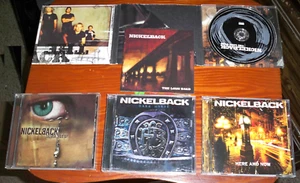 4 NICKELBACK CDs THE LONG ROAD DIGIPAK, SILVER SIDE UP, HERE AND NOW, DARK HORSE - Picture 1 of 8