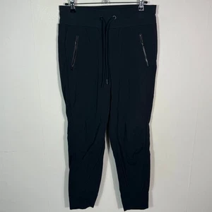 Athleta Trekkie North Jogger Pants Black Nylon Spandex Zip Pockets Women's 6 - Picture 1 of 8