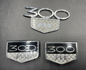 Chrysler 300m 300 m emblema especial maletero trasero insignia fabricante de equipos originales cheque - Imagen 1 de 5