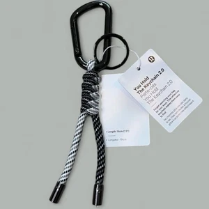 Lululemon You Hold the Schlüsselanhänger 2.0 Neu mit Etikett reflektierend schwarz weiß silber Geschenk selten - Bild 1 von 4