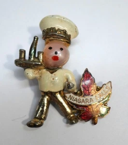 Vintage NIAGARAFÄLLE KANADA SOUVENIR ANSTECKNADEL - COCKTAILKELLNER mit Emaille Ahornblatt - Bild 1 von 6