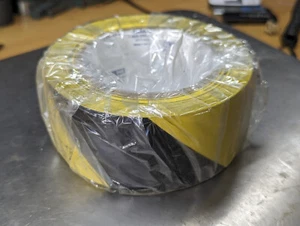 Vinyl Floor Safety Marking Tape(OSHA), 2"x36 yd, 6Mil, PVC, Black/Yellow (1Roll) - Picture 1 of 3