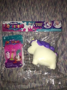 *NUOVO* Slim Sqweezers ORB Sqweezz&Oozz Squishy/Slime White/Purp Unicorn Sweezer - Foto 1 di 4