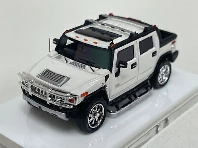 Motorhelix Hummer H2T SUT 6,2 litros V8 en blanco limitado 499 piezas 64-236 1/64 Foto 1 de 4