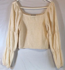 Top casi famoso boho campesino calado L crema texturizado manga globo - Imagen 1 de 10