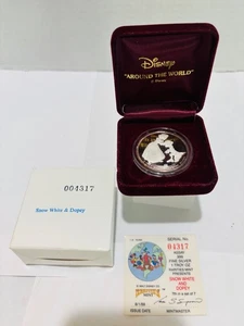 Silbermünze Walt Disney 1 Feinunze 1988 rund, mit orig. box. Schneewittchen & Dopey - Bild 1 von 5