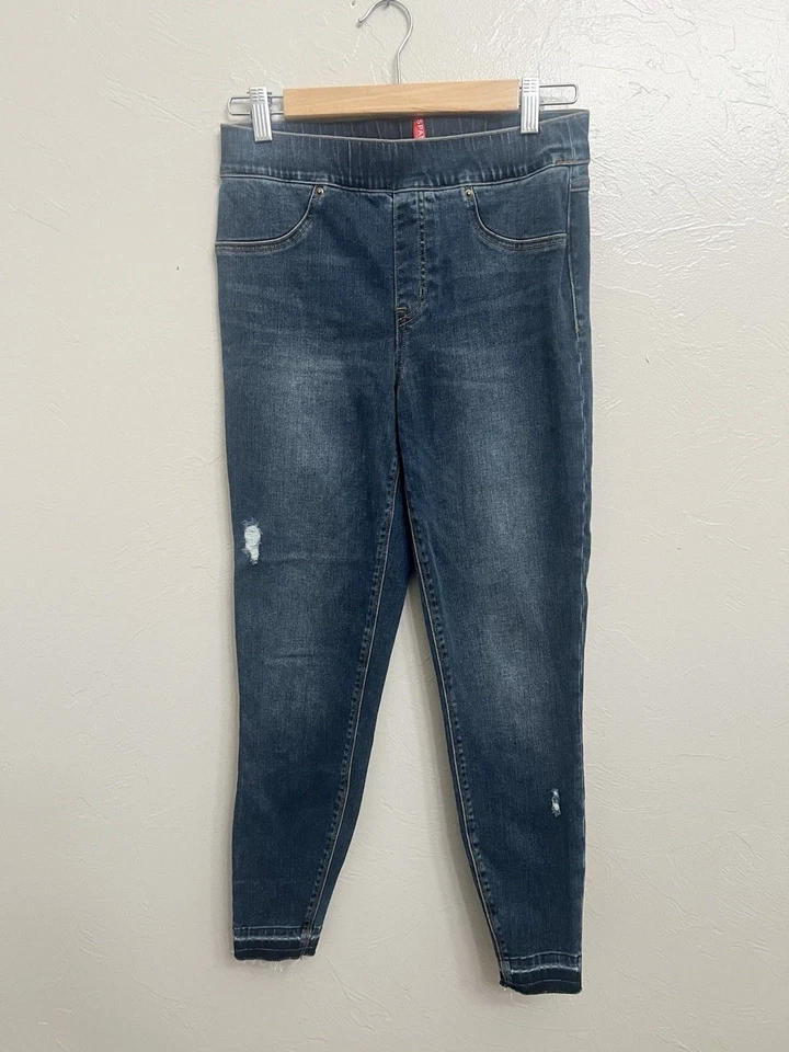 Pantalones de mezclilla ajustados Spanx desgastados al tobillo dobladillo crudo lavado pequeño desgastado Foto 1 de 4