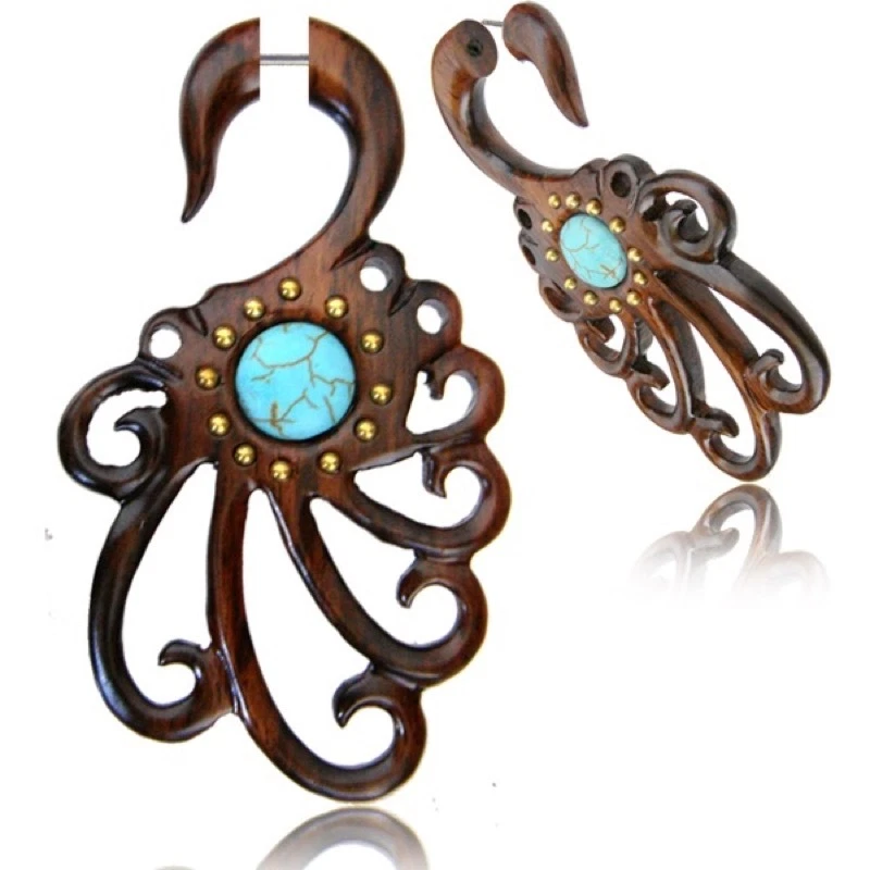 PAR DE TAPONES TRAMPOSOS FALSOS IMITACIÓN MADERA SONO TRIBAL 18G TURQUESA CALIBRES LARGOS GARRAS  Foto 1 de 1