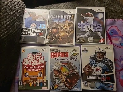 Lote de 6 piezas de juegos Wii pesca, Tiger Woods, Madden 08 etc. en buen estado usado Foto 1 de 4