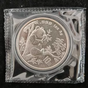 Moneda de plata Panda 1995 China 10 yuanes 1 oz - ramitas grandes - Imagen 1 de 2