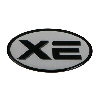 2001-2004 Nissan Frontier "XE" Front Fender emblema adesivo OEM novo genuíno - Imagem 1 de 3