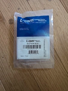 L-Com ECF504-SC6 Cat6 Shielded RJ45 Connector (8X8) Panel Mount Female - Picture 1 of 1