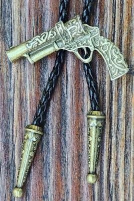 GUN REVOLVER PISTOL RODEO BRONZE COWBOY WESTERN RODEO BOLO TIE - Image 1 of 3