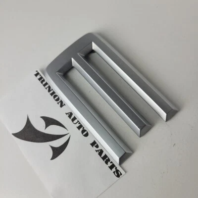 Nissan Frontier 2001-2004 emblema de puerta trasera logotipo insignia letra E OEM Foto 1 de 3