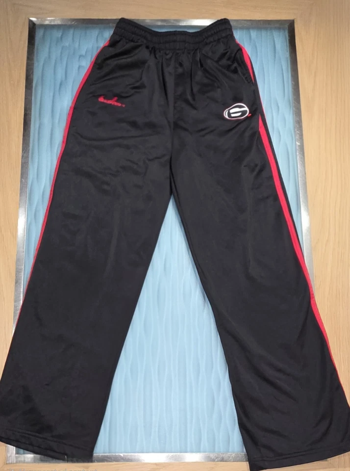 Pantalones de atletismo UGA Bulldogs niños coliseo medio - negros con rayas rojas  Foto 1 de 4