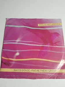7" Single David Bowie / Pat Metheny Group – This Is Not America (EU 1985) VG/VG - Bild 1 von 4