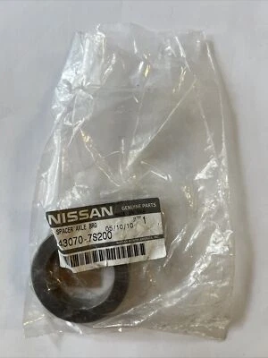 Espaciador de sello de cojinete de eje trasero OEM 04-20 Nissan FRONTIER XTERRA TITAN 43070-7S200 Foto 1 de 3