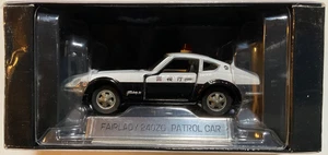 Coche patrulla Nissan Fairlady 240ZG Tomica Limited escala 1/60 blanco/negro #0027 - Imagen 1 de 4